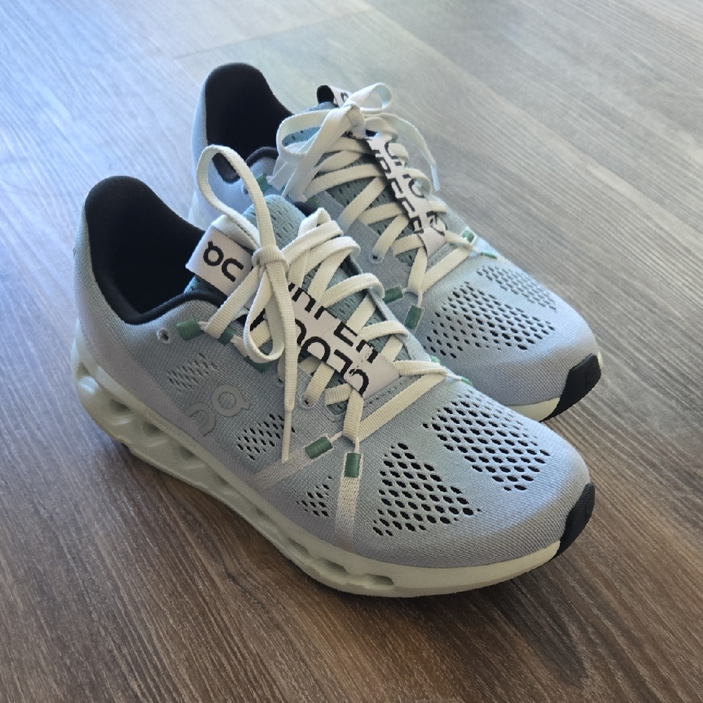 On Running Athletic Shoes in Light Blue and White